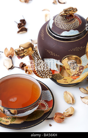 Teaset, tazza da tè con teiera e pot-pourri Foto Stock