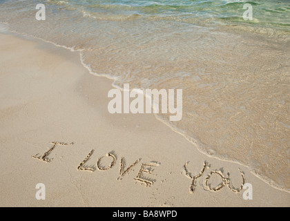 Ti amo messaggio scritto in sabbia Foto Stock