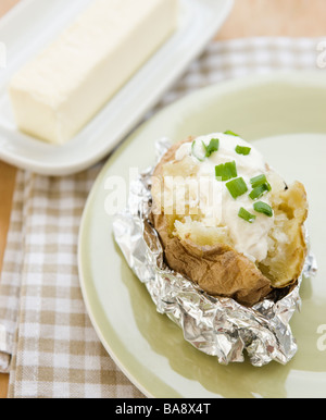 Patate al forno con panna acida Foto Stock