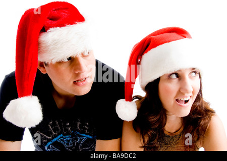 Ritratto di coppia giovane con cappello a Natale Foto Stock