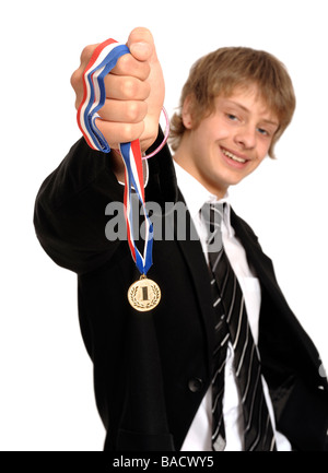 Scolaro con un oro prima medaglia Foto Stock