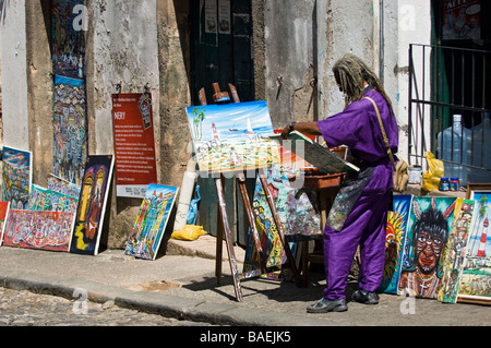 Artista al lavoro nel Pelourinho o area della città vecchia di Salvador de Bahia, Brasile,. Foto Stock