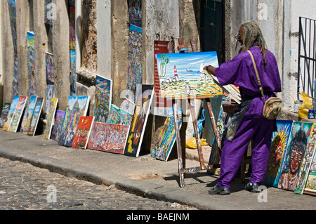 Artista al lavoro nel Pelourinho o area della città vecchia di Salvador de Bahia, Brasile,. Foto Stock