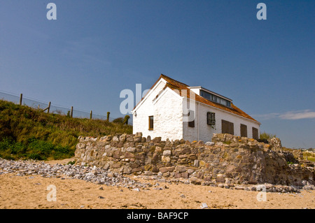 Il vecchio pescatore's cottage a Port Eynon Beach sulla Penisola di Gower Foto Stock