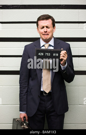 Mugshot di imprenditore Foto Stock