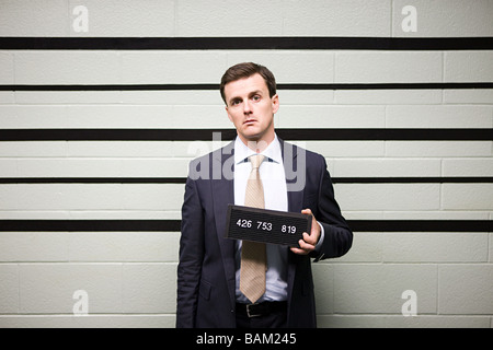 Mugshot di imprenditore Foto Stock