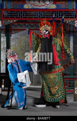 L uomo e la donna in costume cerimoniale Foto Stock