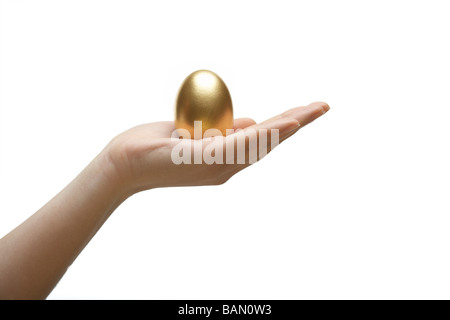 La protezione di un uovo dorato Foto Stock
