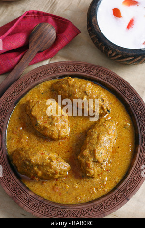 Machh montone kofta è un piatto del Kashmir fatta di fritte di montone tritata con spezie e cotta nel pomodoro saporita di sugo di cipolla Foto Stock