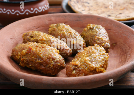 Machh montone kofta è un piatto del Kashmir fatta di fritte di montone tritata con spezie e cotta nel pomodoro saporita di sugo di cipolla Foto Stock