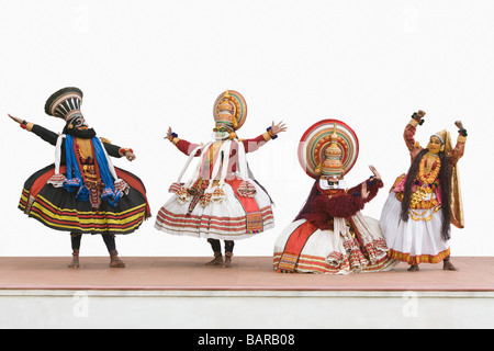 Quattro persone kathakali dancing Foto Stock