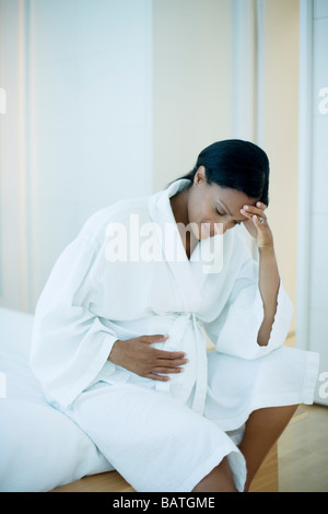 Depressione durante la gravidanza. Ella è a termine. Foto Stock