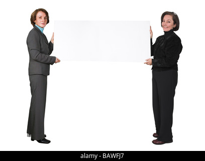 Le donne d'affari tenendo un banner Foto Stock