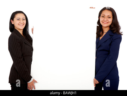 Le donne d'affari tenendo un cartellone Foto Stock