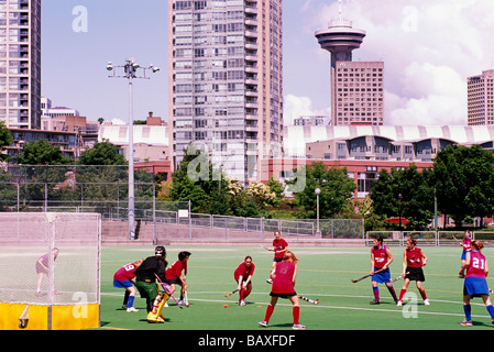 Le donne a giocare donna Field Hockey Sport a "Andy Livingstone' Park Downtown della città di Vancouver British Columbia Canada Foto Stock