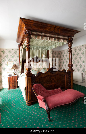 Regno Unito Gloucestershire Foresta di Dean Speech House Hotel ex Royal Hunting Lodge letto a baldacchino in camera da letto Foto Stock