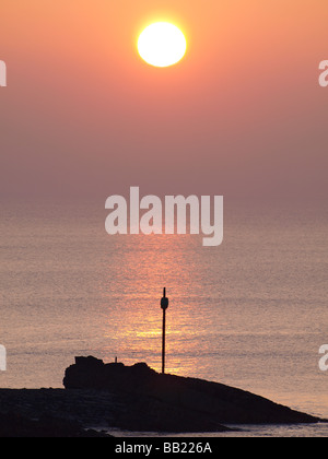 Canna Rock al tramonto. Bude, Cornwall Foto Stock