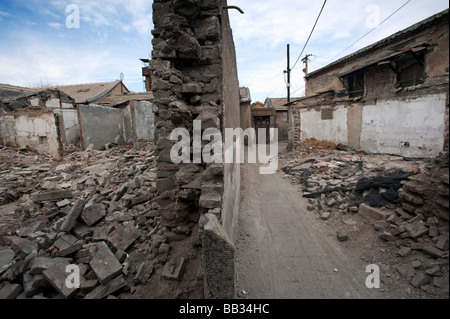 Demolizione in corso di case storiche in una zona di tradizionali hutong strade per la riqualificazione di Pechino Foto Stock