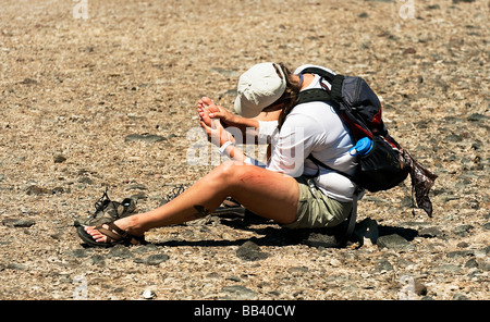 "Spiaggia ferito escursionista' Foto Stock