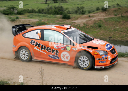 Driver norvegese Henning Solberg e Cato Menkerud alla guida di una Ford Focus a Sardinia World Rally Championship nel 2008 Foto Stock