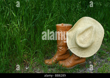 Cappello da cowboy e stivali Foto Stock