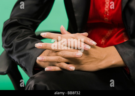 La donna nel suo lavoro-legati alla vita di tutti i giorni, la postura, il linguaggio del corpo Foto Stock