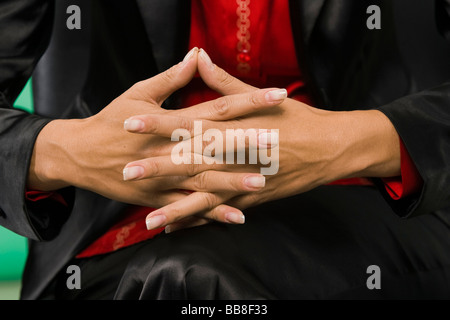 La donna nel suo lavoro-legati alla vita di tutti i giorni, la postura, il linguaggio del corpo Foto Stock