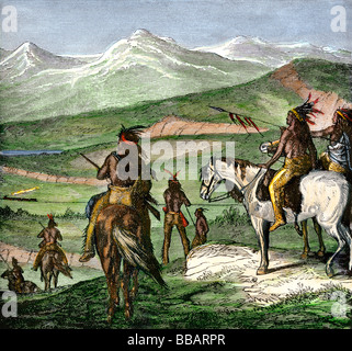 Nativi Americani come ottenere la loro prima vista della ferrovia transcontinentale 1860s. Colorate a mano la xilografia Foto Stock