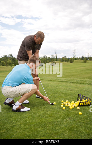 L'uomo ad apprendere come Golf, Burlington, Ontario, Canada Foto Stock