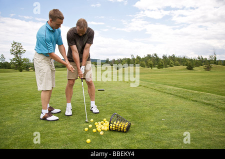 L'uomo ad apprendere come Golf, Burlington, Ontario, Canada Foto Stock