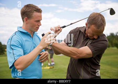 L'uomo ad apprendere come Golf, Burlington, Ontario, Canada Foto Stock