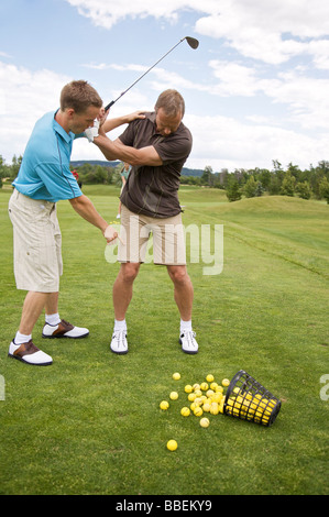 L'uomo ad apprendere come Golf, Burlington, Ontario, Canada Foto Stock