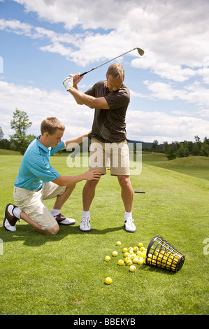 L'uomo ad apprendere come Golf, Burlington, Ontario, Canada Foto Stock