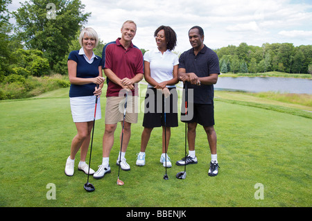 Ritratto di gruppo di golfisti Foto Stock