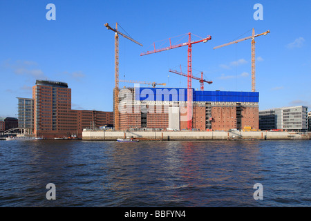 Sito in costruzione, Elbphilharmonie philharmonic hall, Kaispeicher magazzino, Hafencity Harbor City, il porto di Amburgo, Germania, Foto Stock