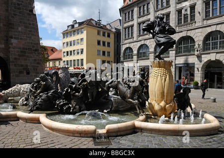 Fontana "Ehekarussell', il matrimonio giostra, Norimberga, Media Franconia, Baviera, Germania, Europa Foto Stock