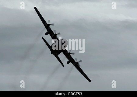 Lockheed C 130 Hercules bancario degli aerei in volo Foto Stock