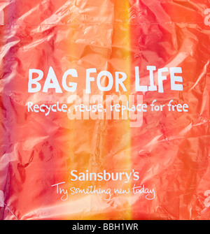 Un supermercato Sainsburys eco-friendly di plastica riutilizzabile shopping bag per la vita. Regno Unito. Foto Stock