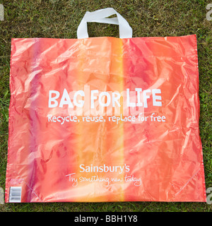 Un supermercato Sainsburys riciclato, eco friendly riutilizzabile borsa shopping per la vita. Regno Unito Foto Stock