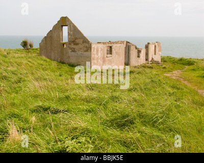 Cottage abbandonati sulla costa est della Scozia Foto Stock