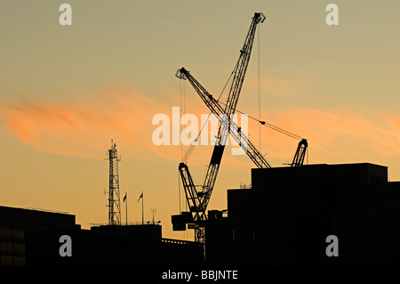 Costruzione di gru silhouette in Birmingham Foto Stock