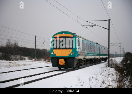 C2C 170115 unità diesel ad alta velocità per il treno in inverno la neve East Coast Main Line Railway Peterborough Cambridgeshire England Regno Unito Foto Stock