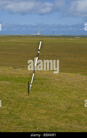 Dh Linklet Bay North Ronaldsay ORKNEY Putting green pole sul campo da golf links foro bandiera Foto Stock