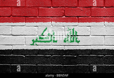 Bandiera dell'Iraq sul muro di mattoni Foto Stock