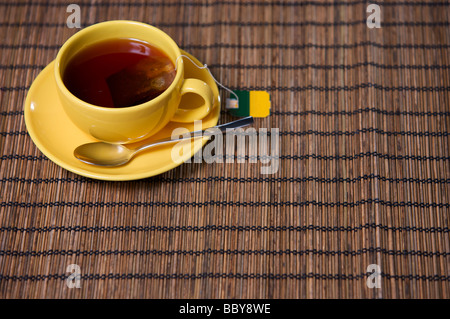 Tazza gialla Foto Stock