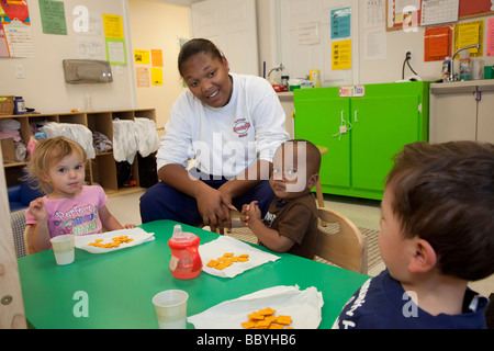 'Child Care' 'day' cura materna di puericultura Foto Stock