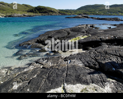 Azzurro acqua sulla spiaggia a Sanna Bay sulla penisola a Ardnamurchan in Scozia Foto Stock