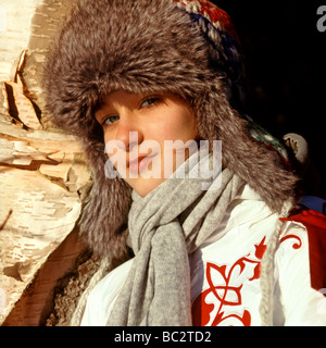 La ragazza della PAC con auricolari a lembi Foto Stock