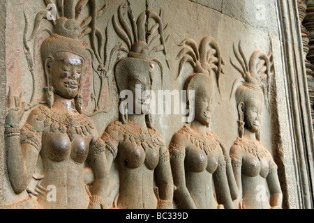 [Bassorilievo] di devata femmina figure 'close up", [Angkor Wat] rovine di templi, Cambogia Foto Stock