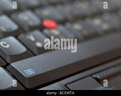 Dettaglio di un Lenovo/IBM tastiera notebook con Trackpoint e Touchpad. Foto Stock